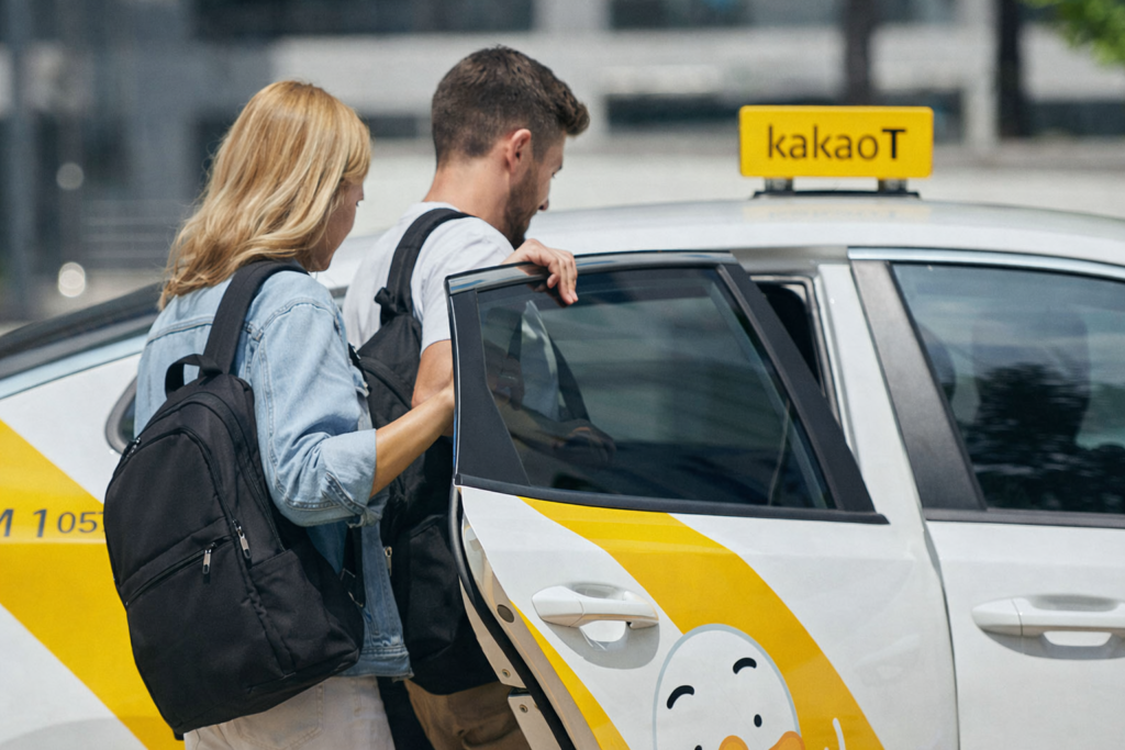 Foreign tourists getting into a Kakao taxi in Seoul South Korea with luggage